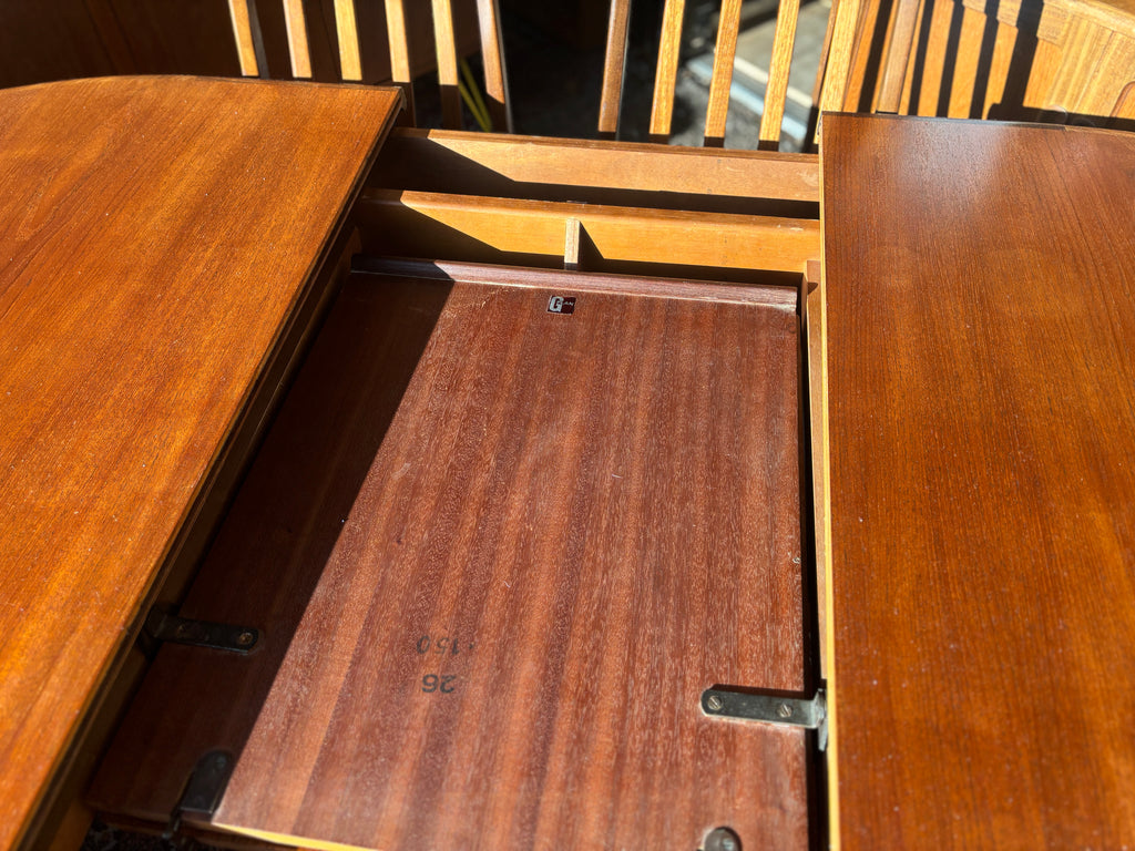 Mid Century early G-Plan teak extendable table and chairs with black vinyl