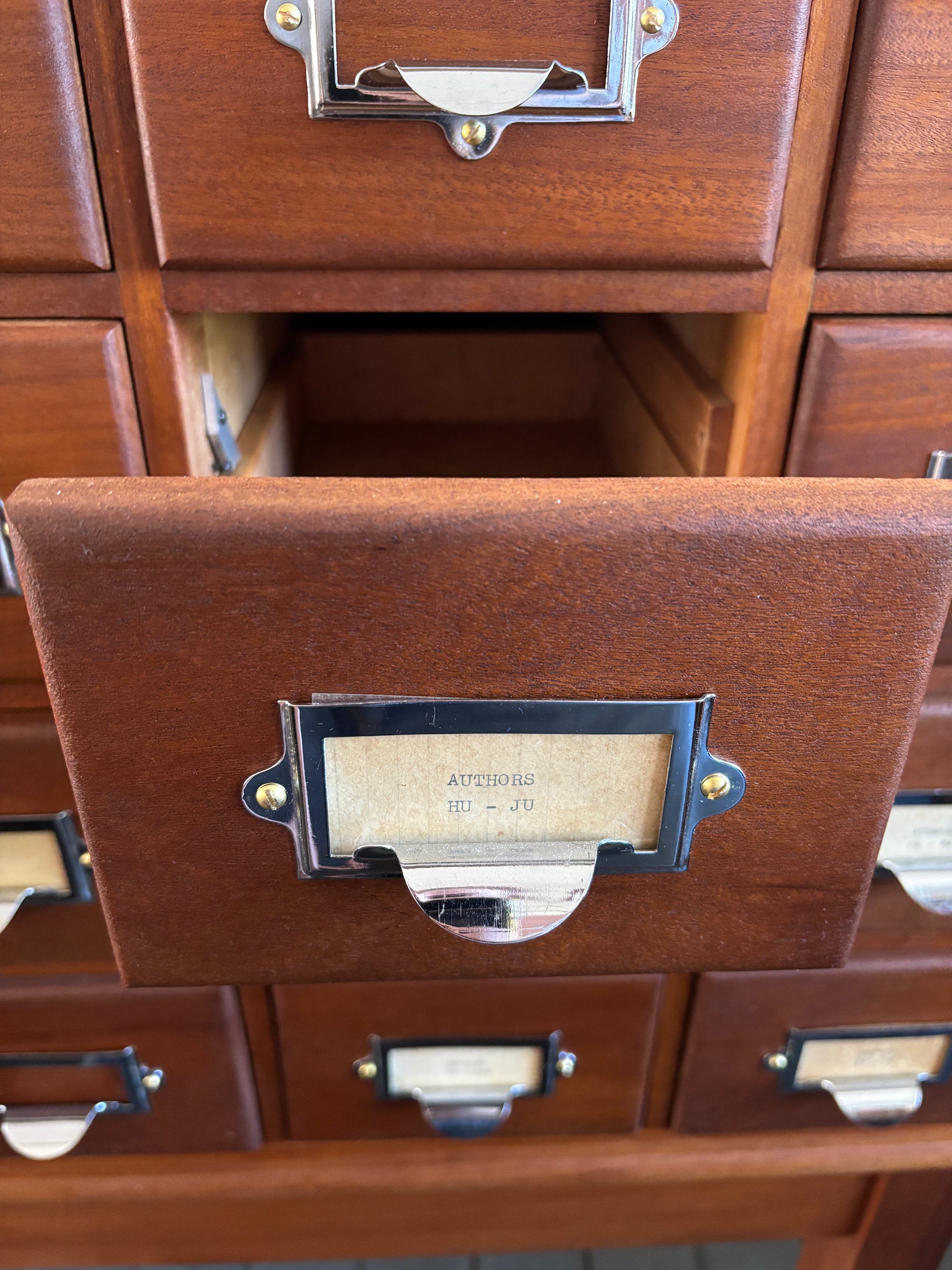 Mid century bank of library card drawers