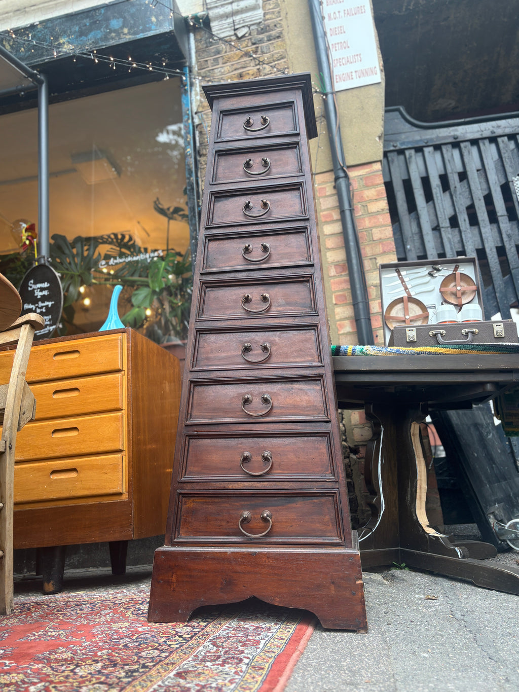 Wooden pyramid tallboy