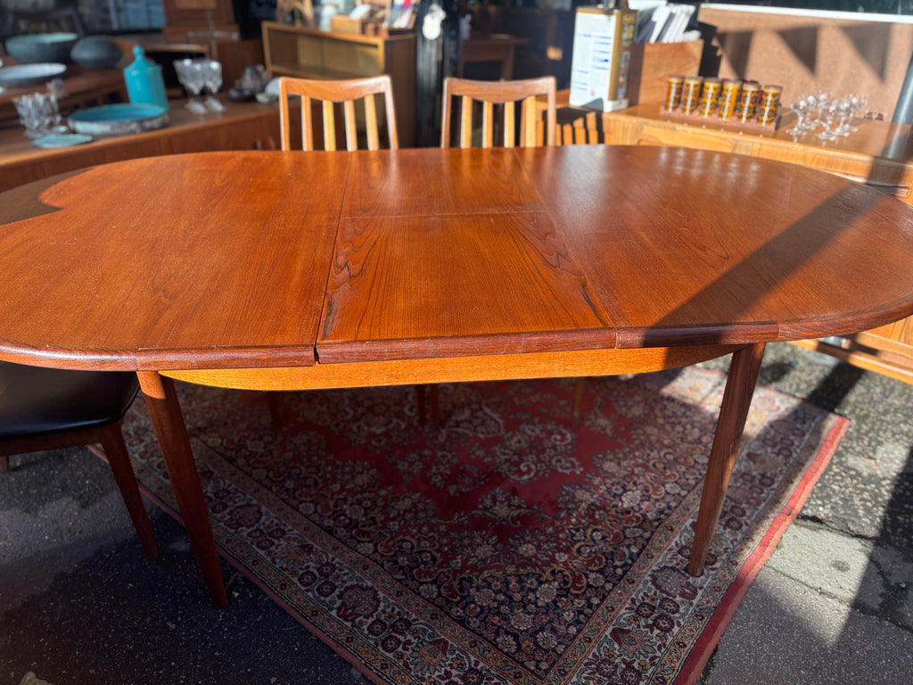 Mid Century early G-Plan teak extendable table and chairs with black vinyl