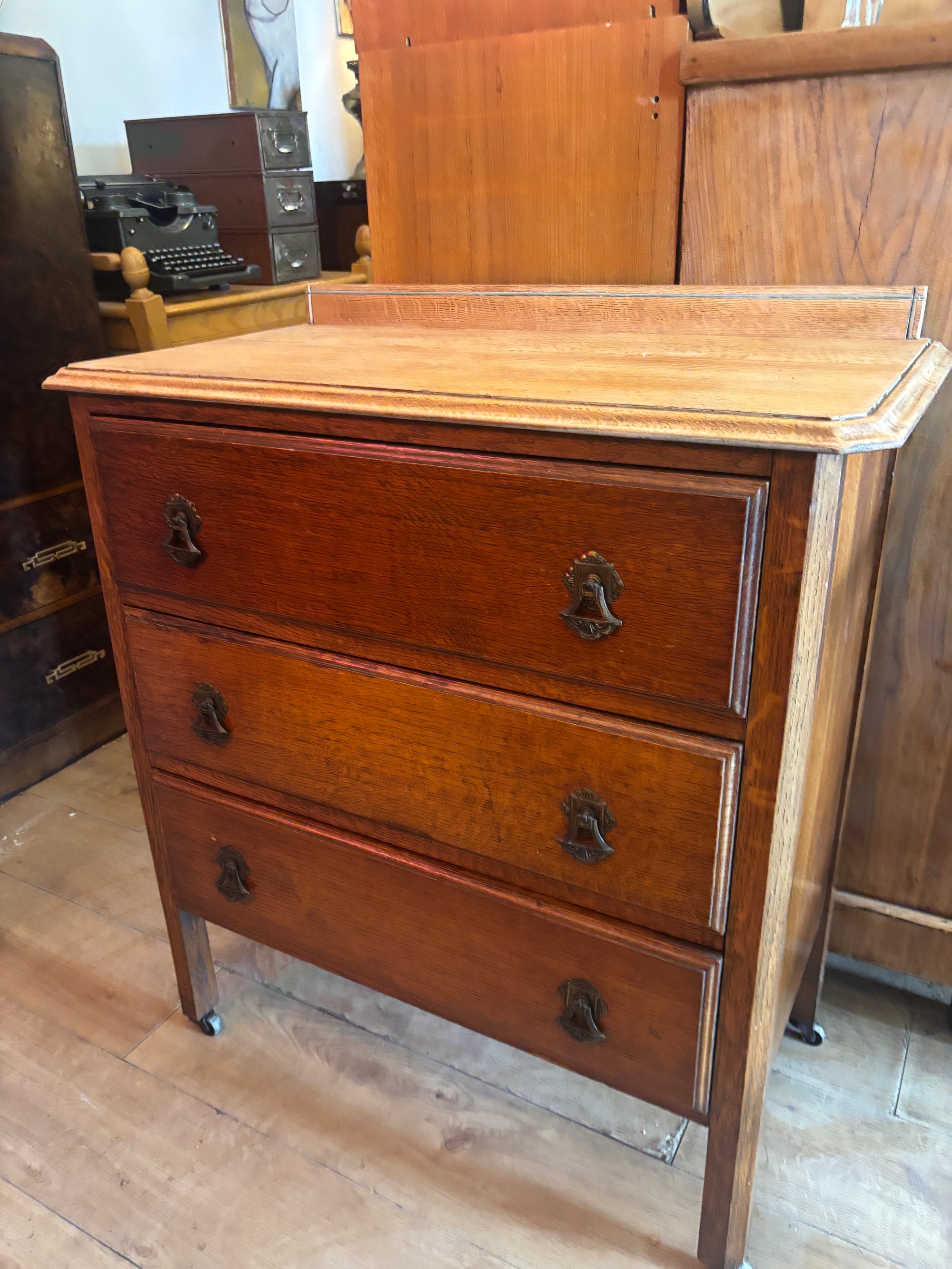 Antique Victorian oak set of drawers on casters