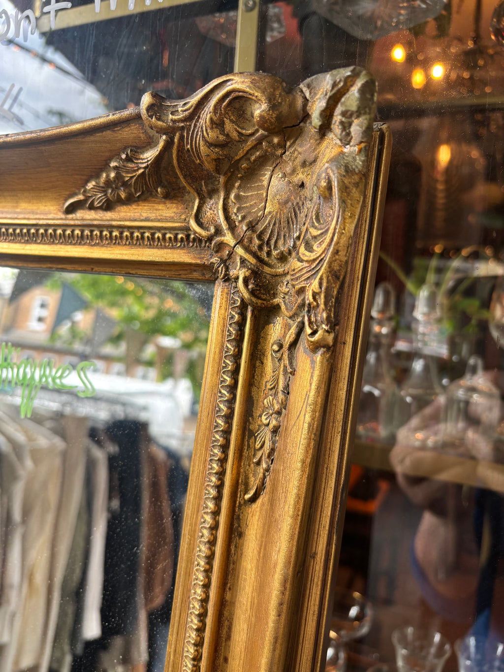 Vintage distressed baroque style gilt mirror