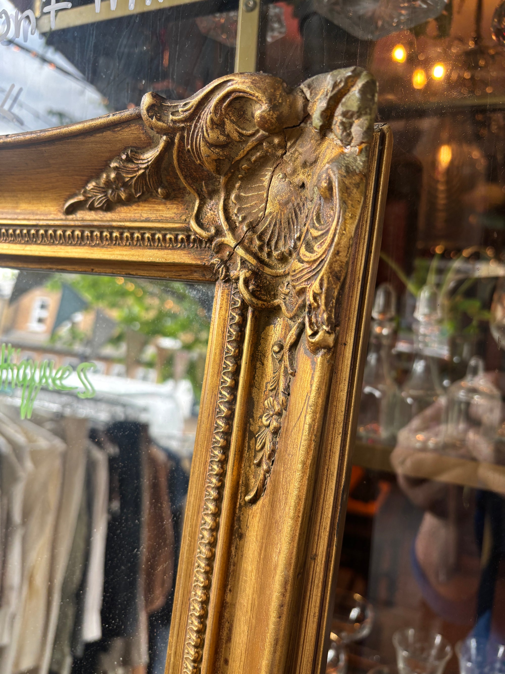 Vintage distressed baroque style gilt mirror