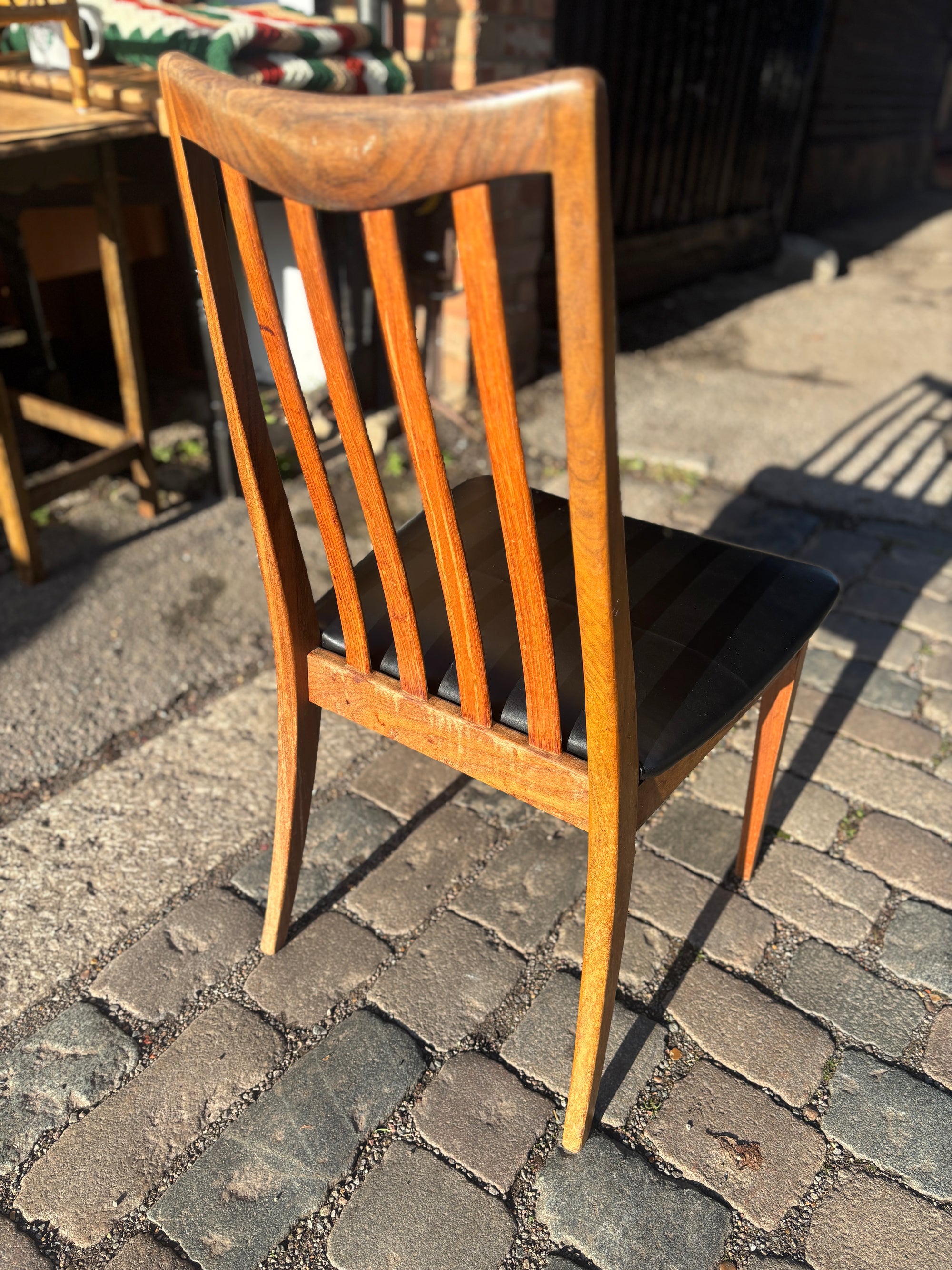 Mid Century early G-Plan teak extendable table and chairs with black vinyl