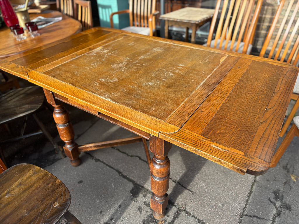 Antique oak draw leaf table