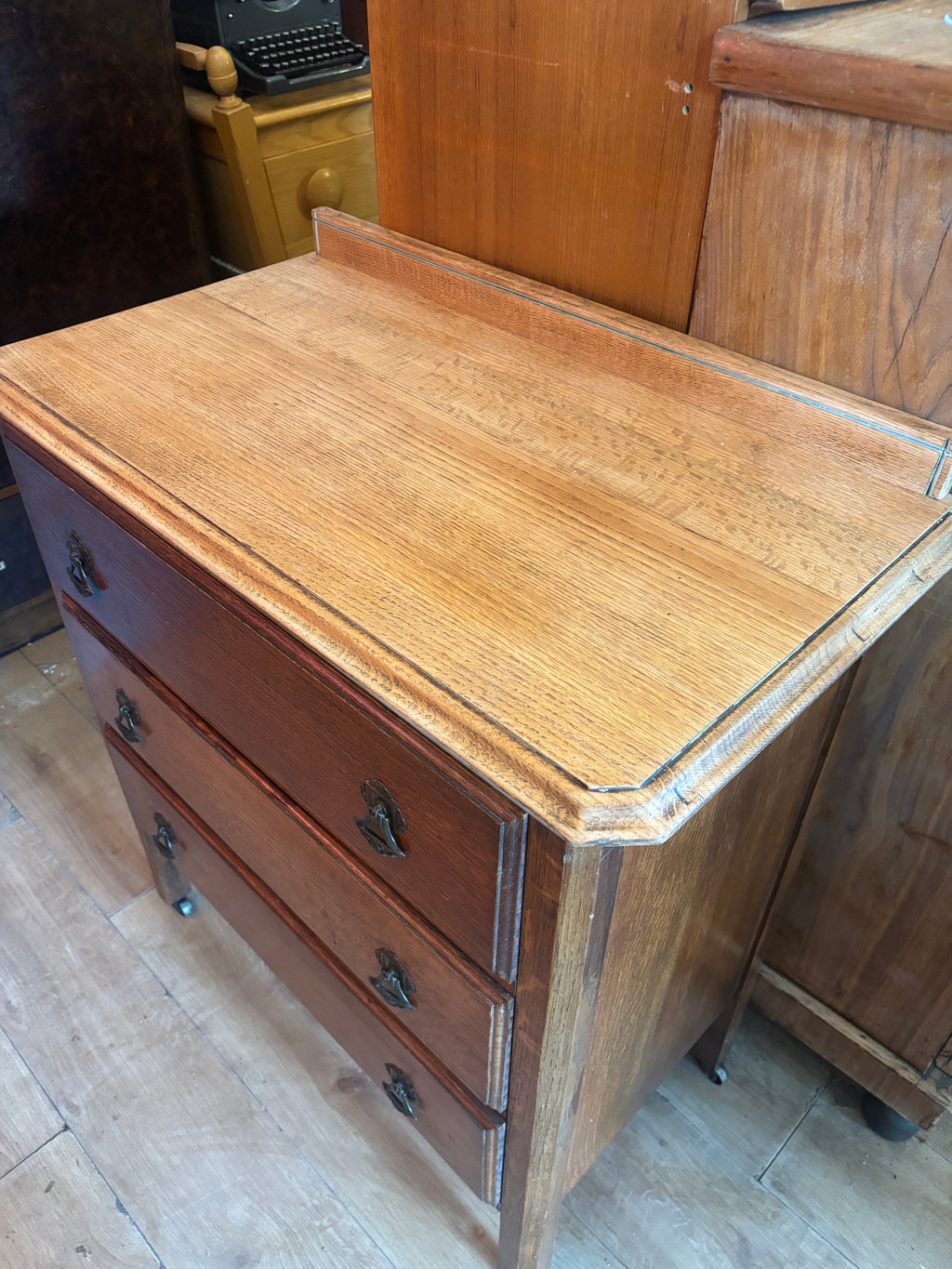 Antique Victorian oak set of drawers on casters
