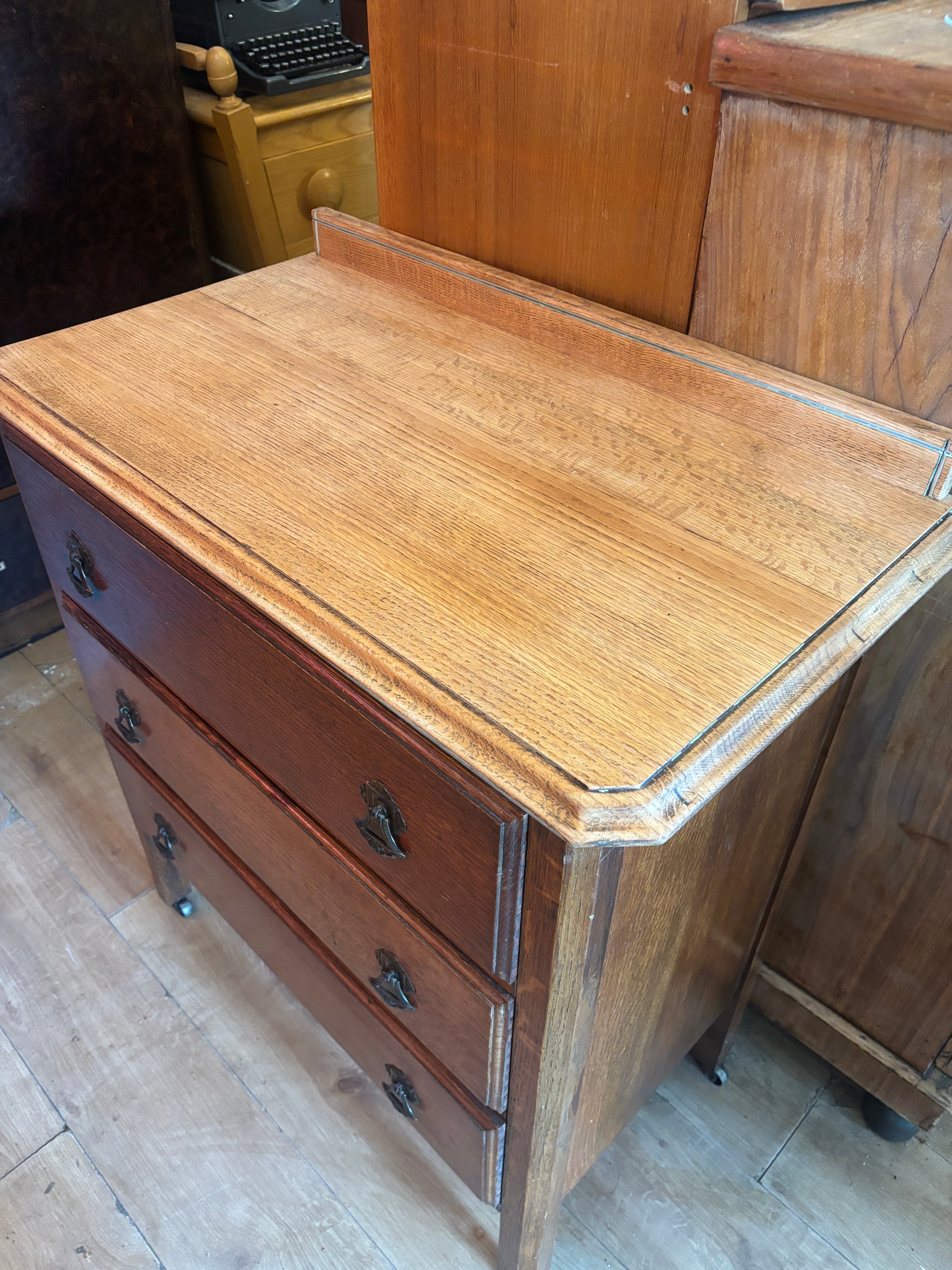 Antique Victorian oak set of drawers on casters