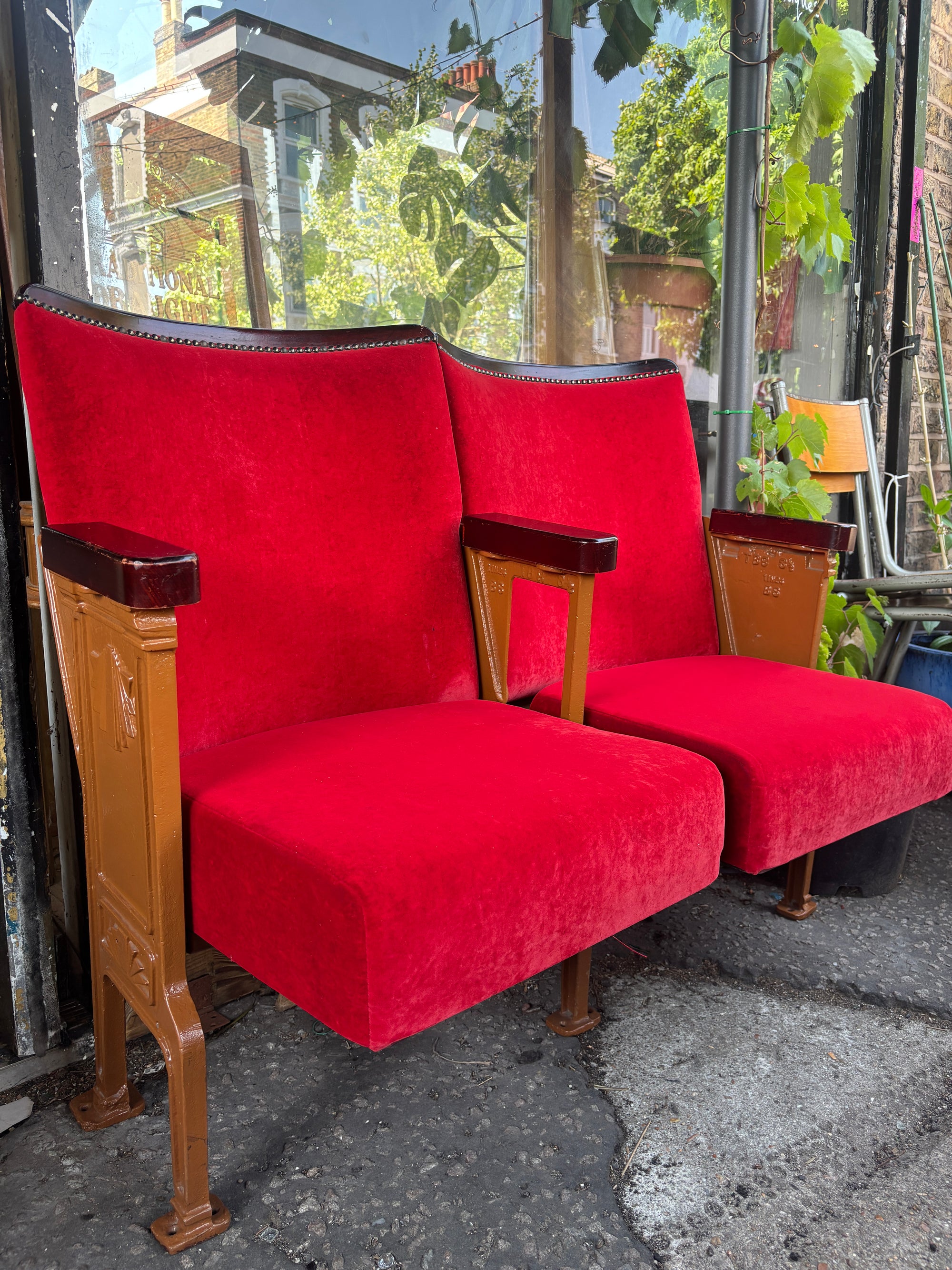 Art Deco red velvet and cast iron theatre chairs