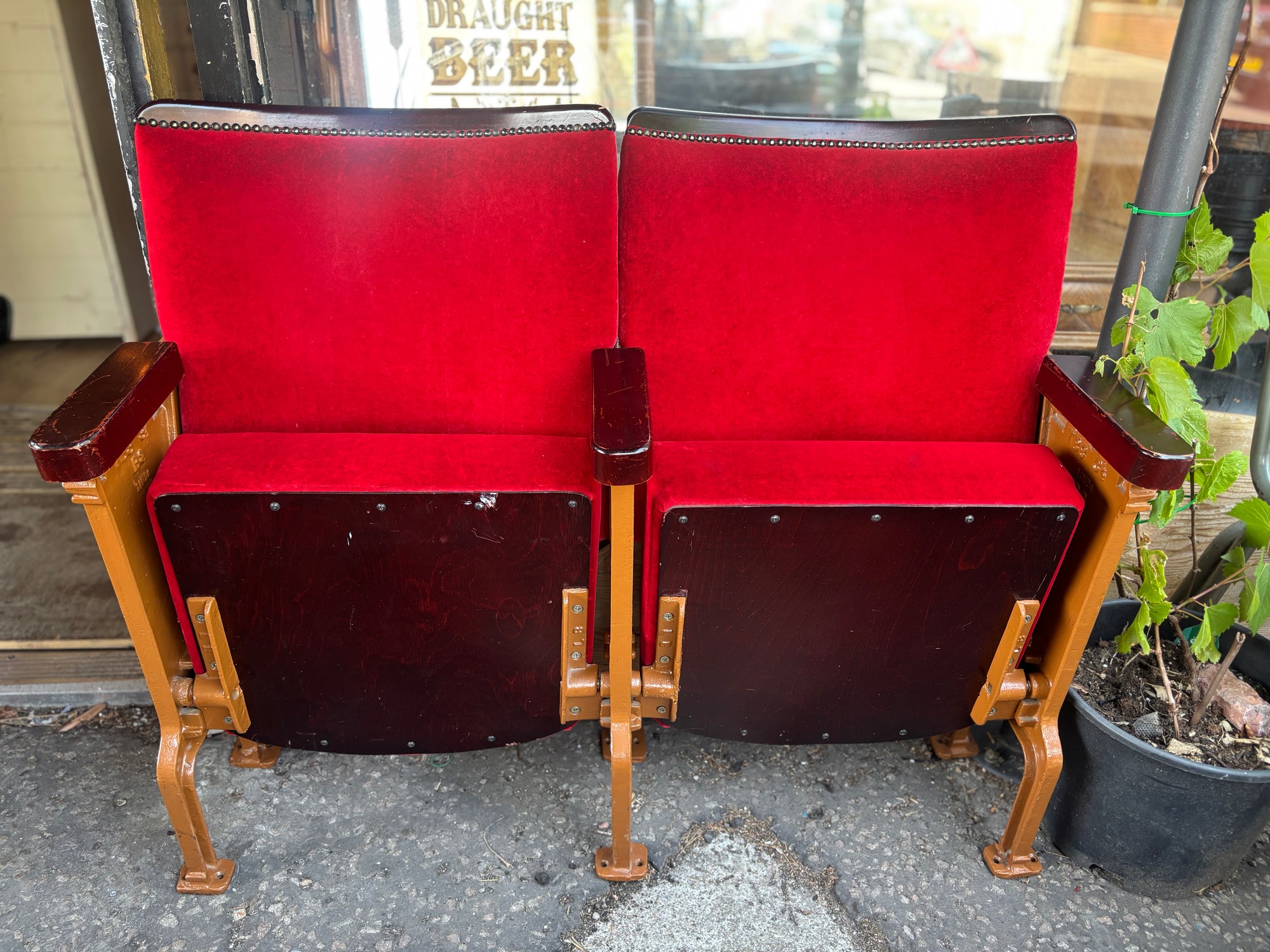 Art Deco red velvet and cast iron theatre chairs