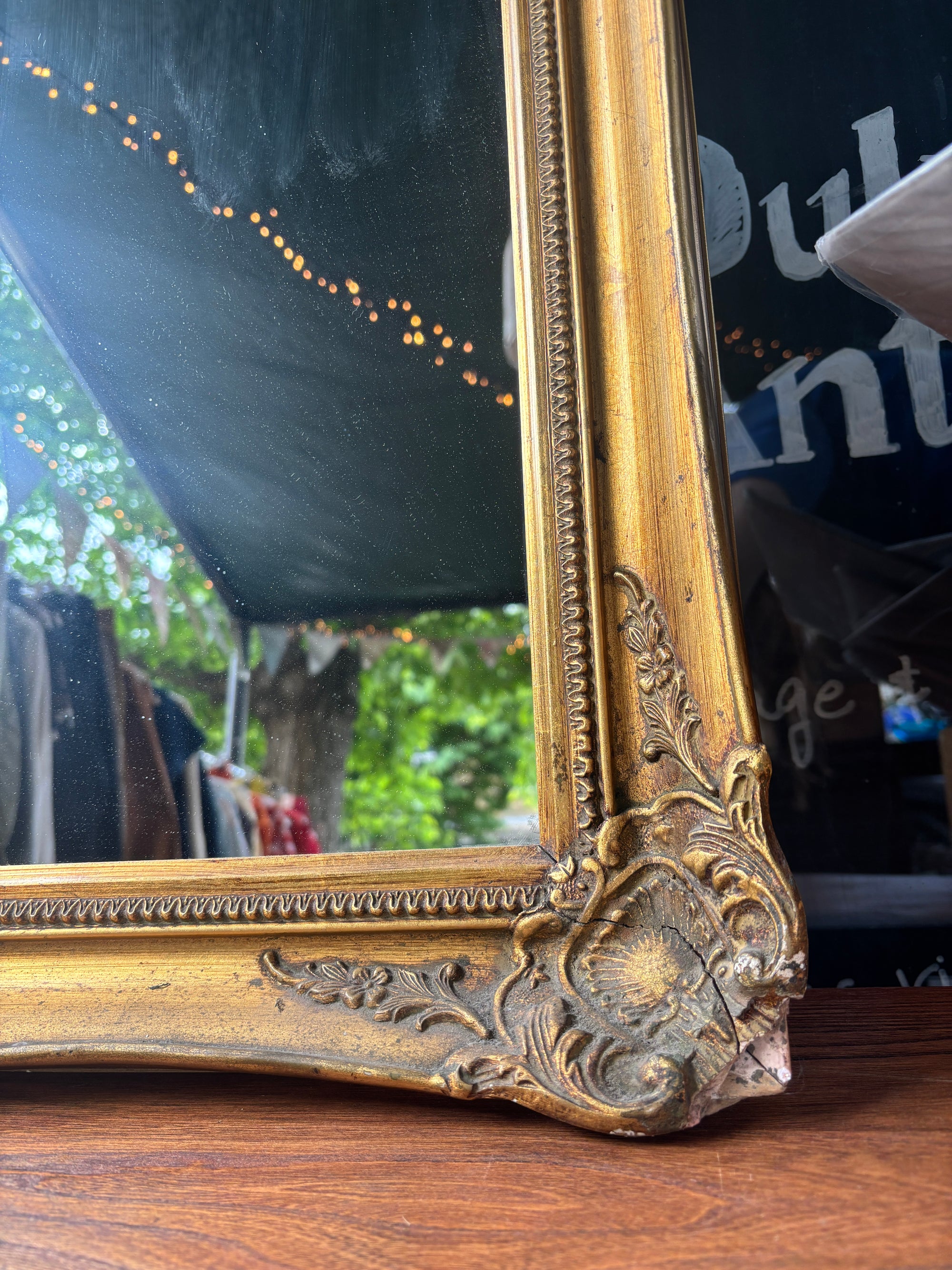 Vintage distressed baroque style gilt mirror