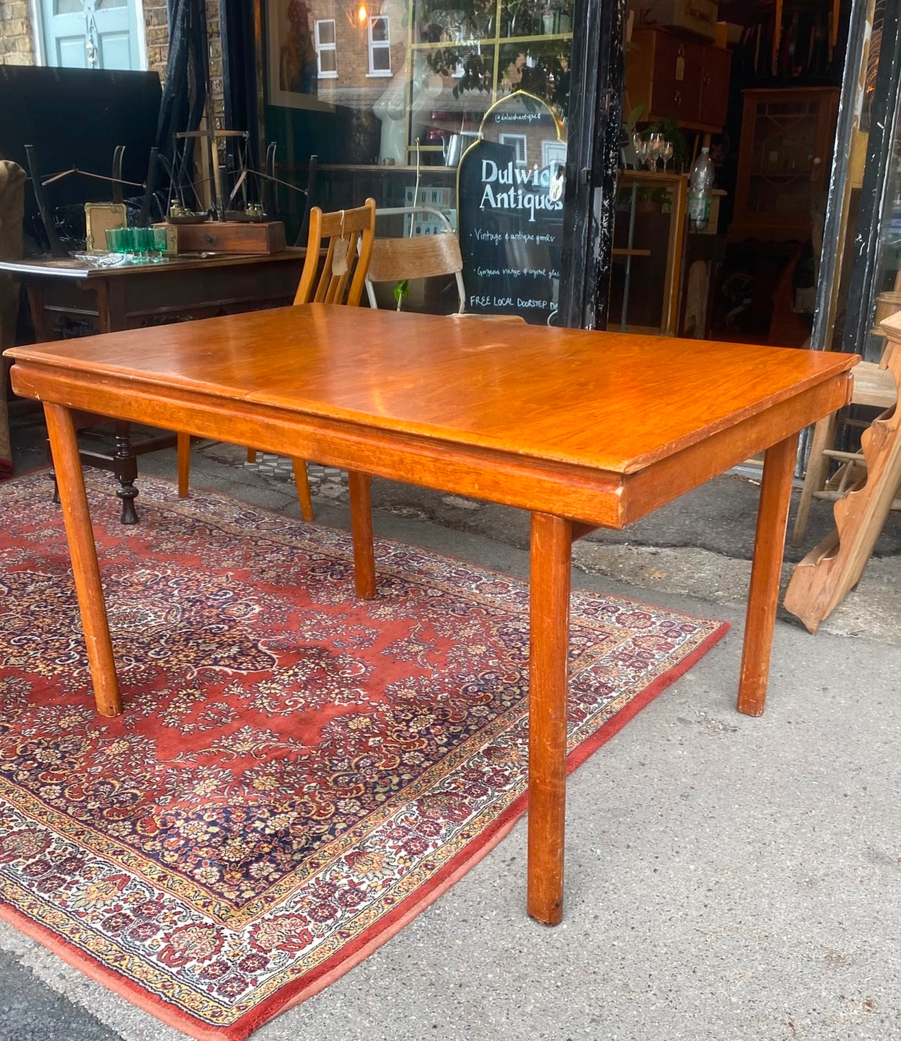 Classic mid century teak Danish extending dining table