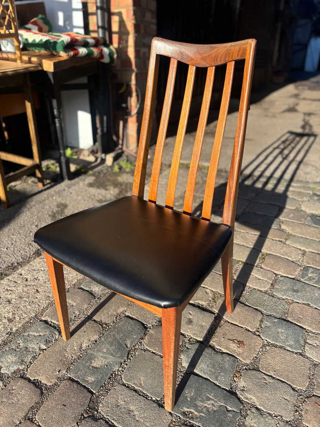 Mid Century early G-Plan teak extendable table and chairs with black vinyl