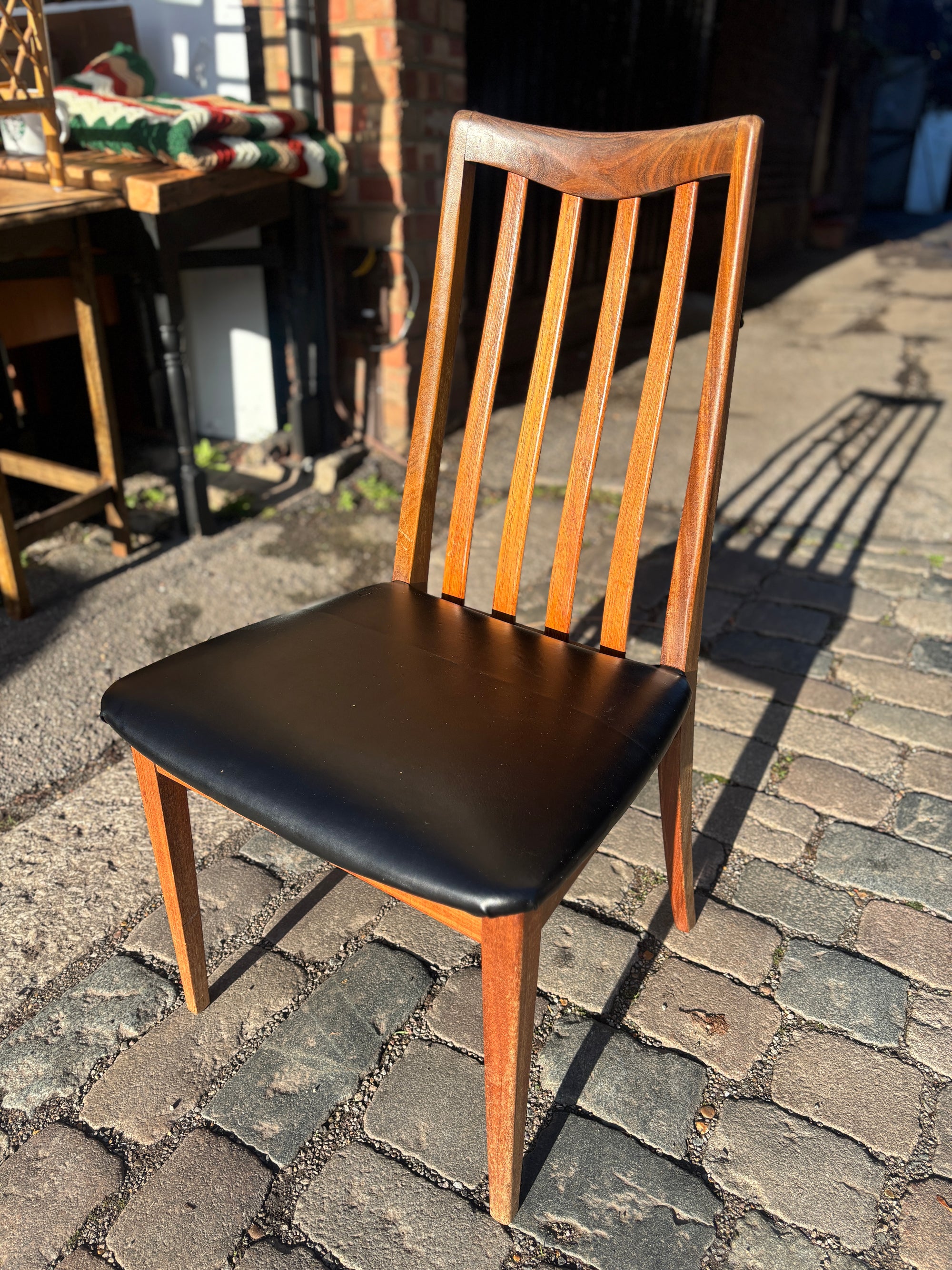 Mid Century early G-Plan teak extendable table and chairs with black vinyl
