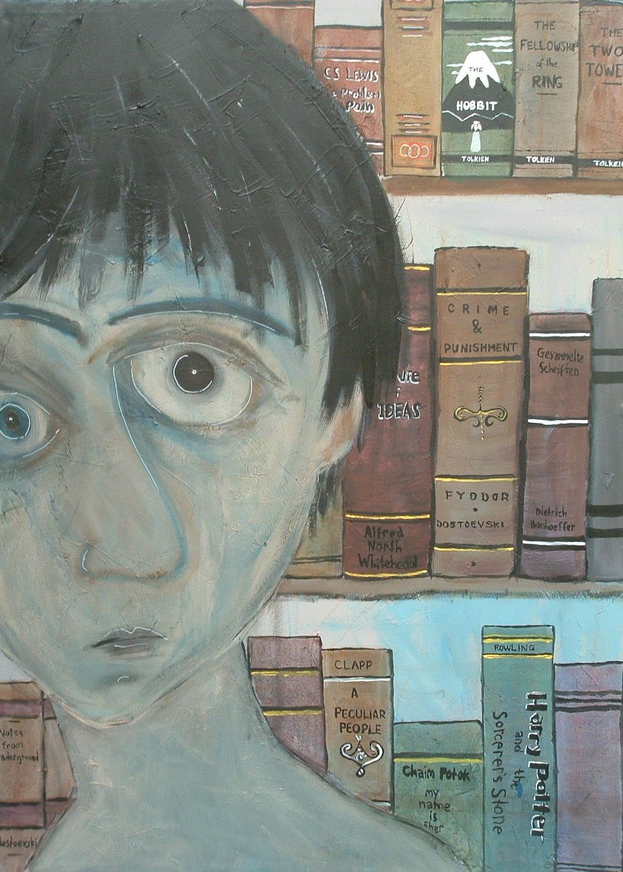 Self portrait of Nick Swanson in front of a bookshelf